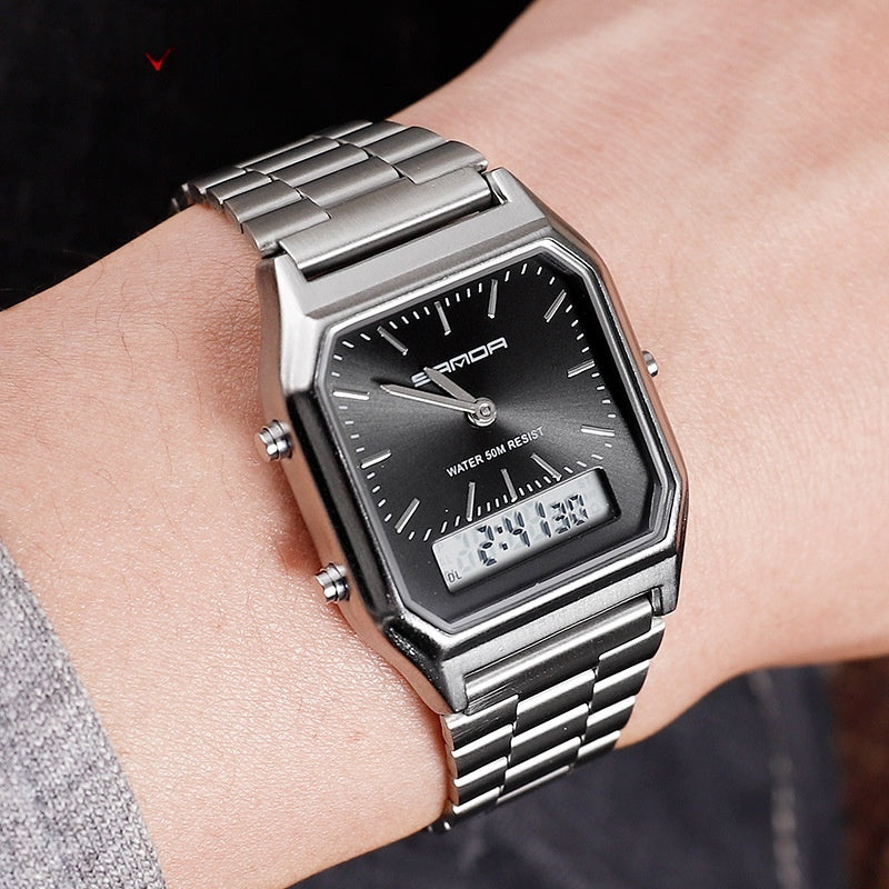 Silver watch with black face on a wrist